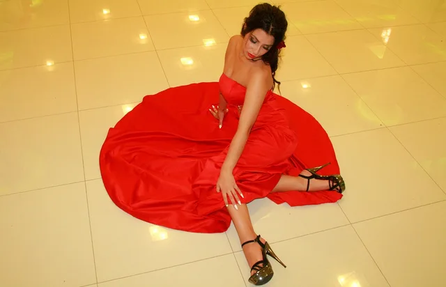 face, dress, red, sensuality, beauty. A red-carpet fashion checklist for fabric, fit, and movement